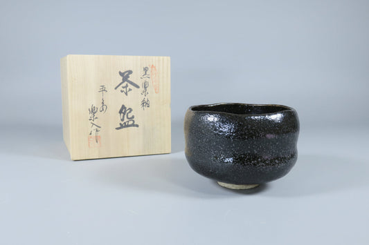 Black Raku matcha tea bowl by Rakunyu, kuro-raku chawan hand-shaped in the lineage Sen no Rikyu established