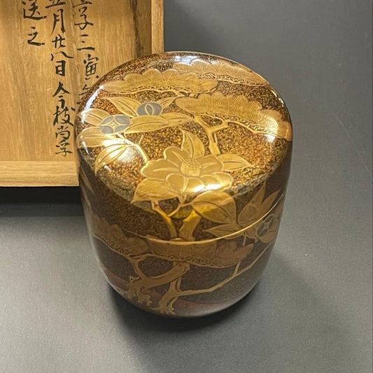 An Edo-period maki-e natsume tea caddy with 1746 box inscription, the gold autumn-grass motif still glowing after 280 years