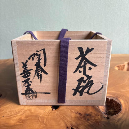 Black Stoneware Matcha Bowl by Toan — Hand-Painted Amber Crest Motif, Signed Box