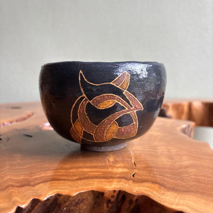 Black Stoneware Matcha Bowl by Toan — Hand-Painted Amber Crest Motif, Signed Box