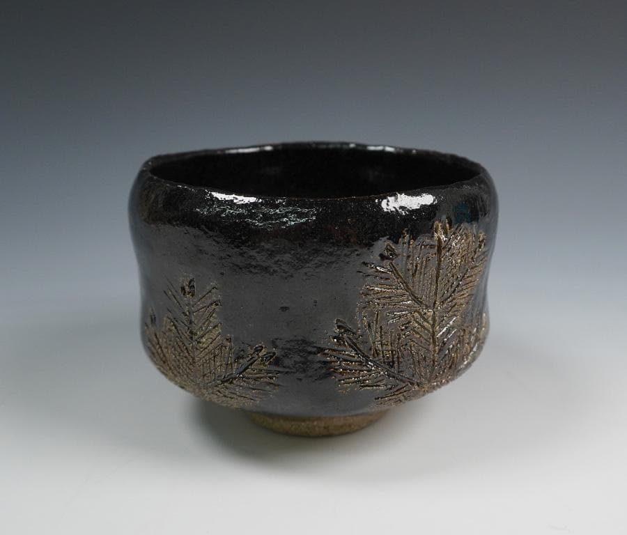 Kiyomizuyaki Black Raku Chawan "Chinenno Midori" — Young Pine Motif with Inscription Box