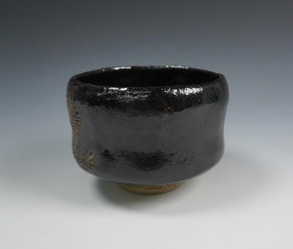 Kiyomizuyaki Black Raku Chawan "Chinenno Midori" — Young Pine Motif with Inscription Box
