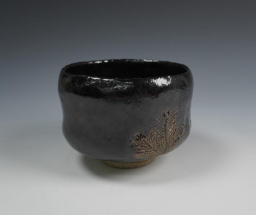 Kiyomizuyaki Black Raku Chawan "Chinenno Midori" — Young Pine Motif with Inscription Box
