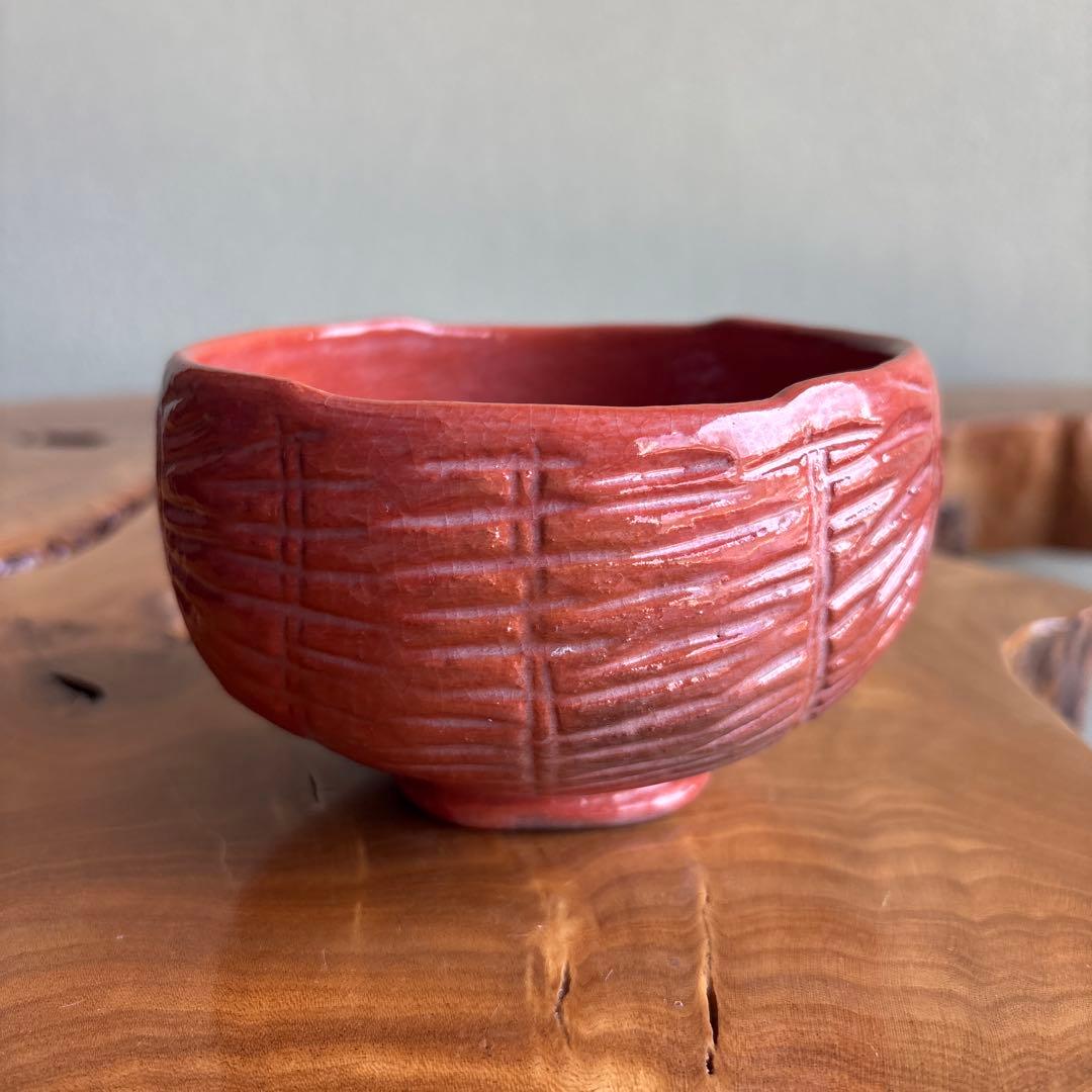 Red Raku Tawara Tea Bowl with Gold Kotobuki by Ono Keizan