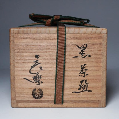 Ogawa Choraku Black Raku Tea Bowl with Do-jime Waist and Twisted Carving