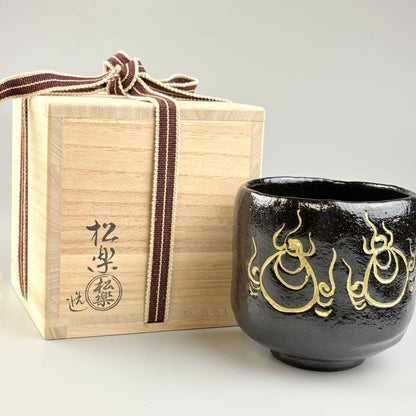 Kuro Raku Chawan by Sasaki Shoraku — Chonyu-Style Black Tea Bowl with Gold Flame Motif, Signed by Fukumoto Sekio of Daitoku-ji