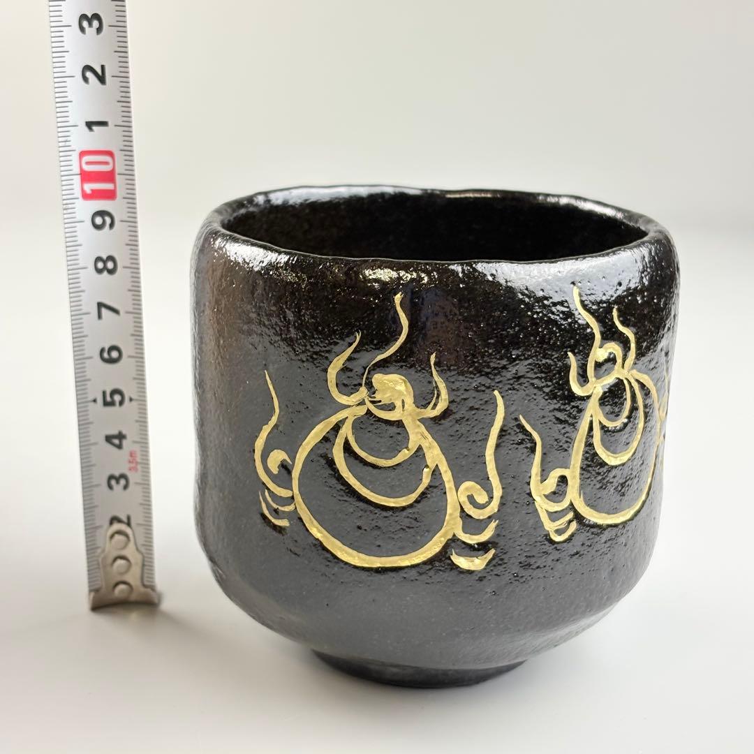 Kuro Raku Chawan by Sasaki Shoraku — Chonyu-Style Black Tea Bowl with Gold Flame Motif, Signed by Fukumoto Sekio of Daitoku-ji