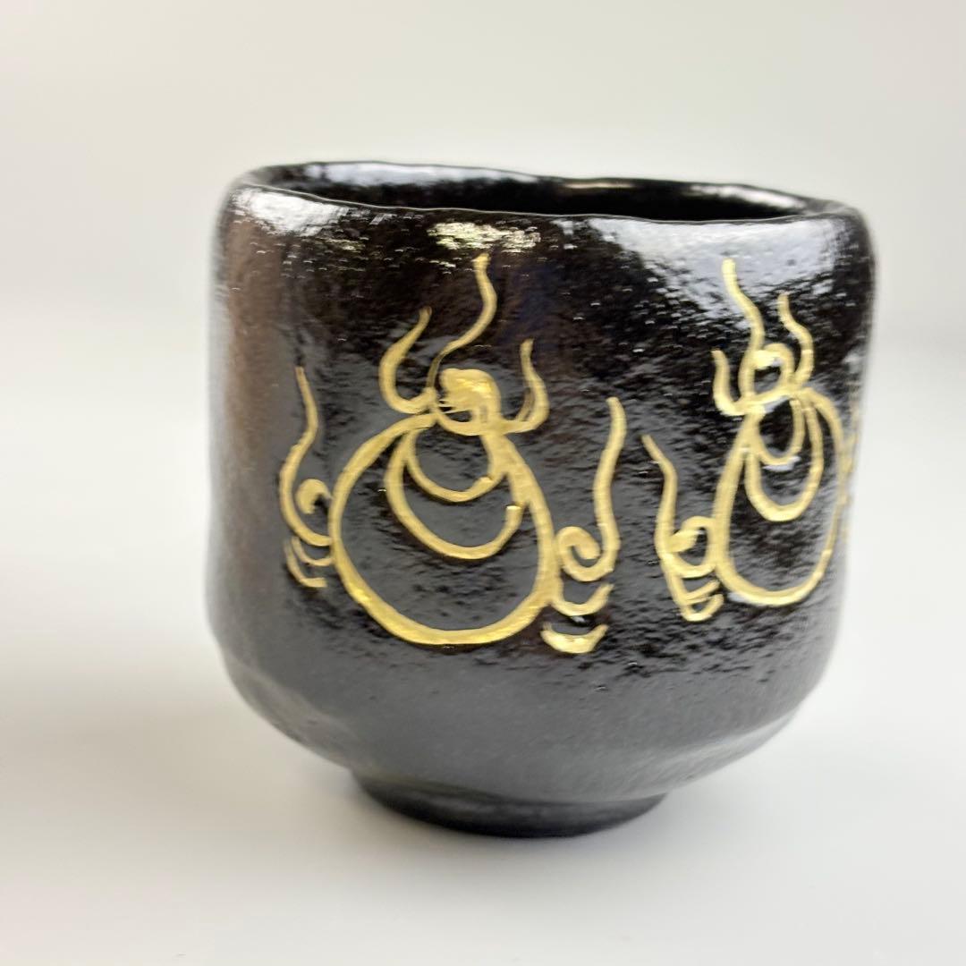 Kuro Raku Chawan by Sasaki Shoraku — Chonyu-Style Black Tea Bowl with Gold Flame Motif, Signed by Fukumoto Sekio of Daitoku-ji