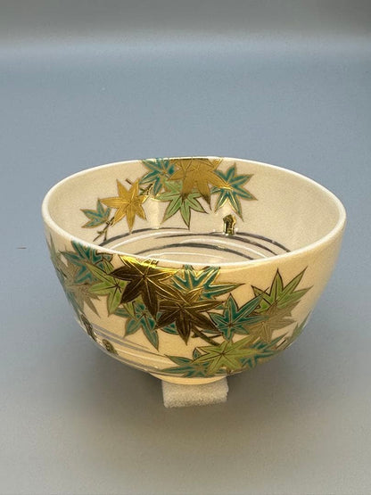 Makuzu Kōsai (Miyagawa Kōsai) Tea Bowl — Green Maple Leaves, Gold on Cream, Kyoto Pottery