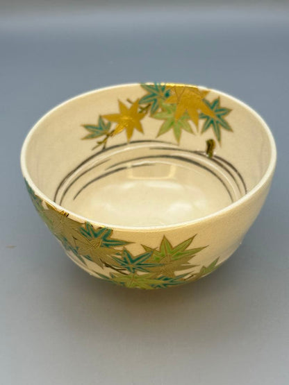 Makuzu Kōsai (Miyagawa Kōsai) Tea Bowl — Green Maple Leaves, Gold on Cream, Kyoto Pottery