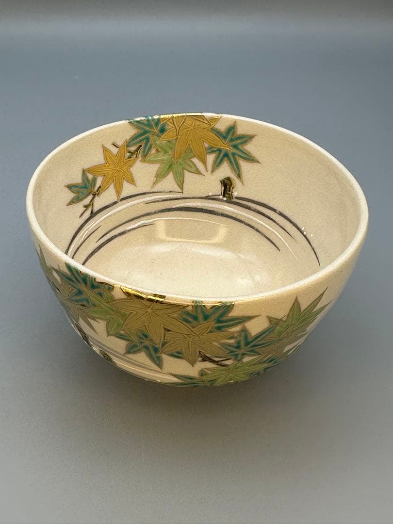 Makuzu Kōsai (Miyagawa Kōsai) Tea Bowl — Green Maple Leaves, Gold on Cream, Kyoto Pottery