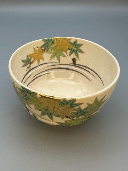 Makuzu Kōsai (Miyagawa Kōsai) Tea Bowl — Green Maple Leaves, Gold on Cream, Kyoto Pottery