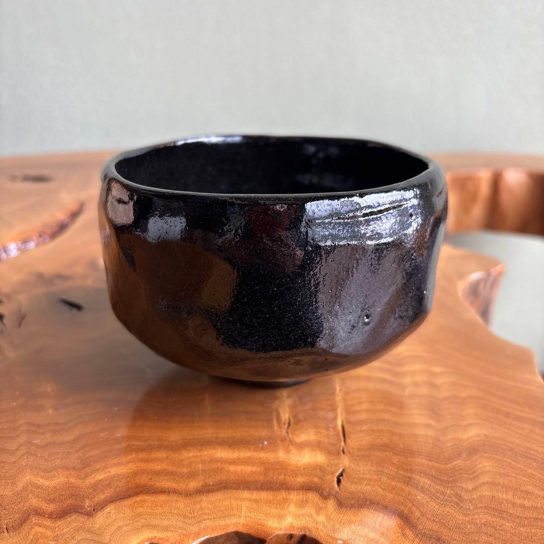 Black Raku Chawan "Ichie" by Sasaki Shoraku, Calligraphy Box by Musei Kanju of Daitoku-ji, Gold Accents
