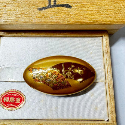 Wajima-nuri Obidome — Chrysanthemum & Plum Maki-e, Tomobako