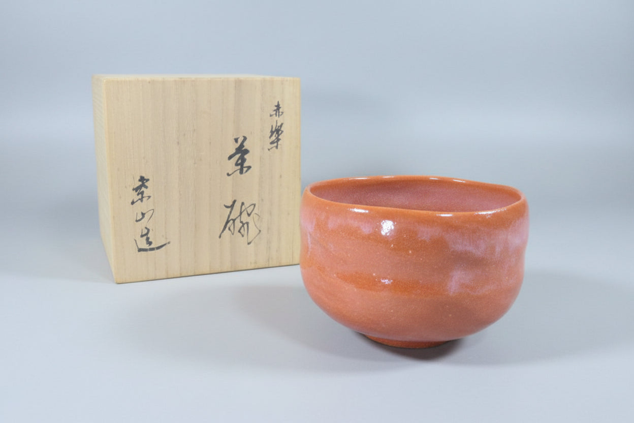 Aka-Raku Red Tea Bowl by Rakuzan - Hand-Shaped Chawan with Spiral Foot and Signed Box