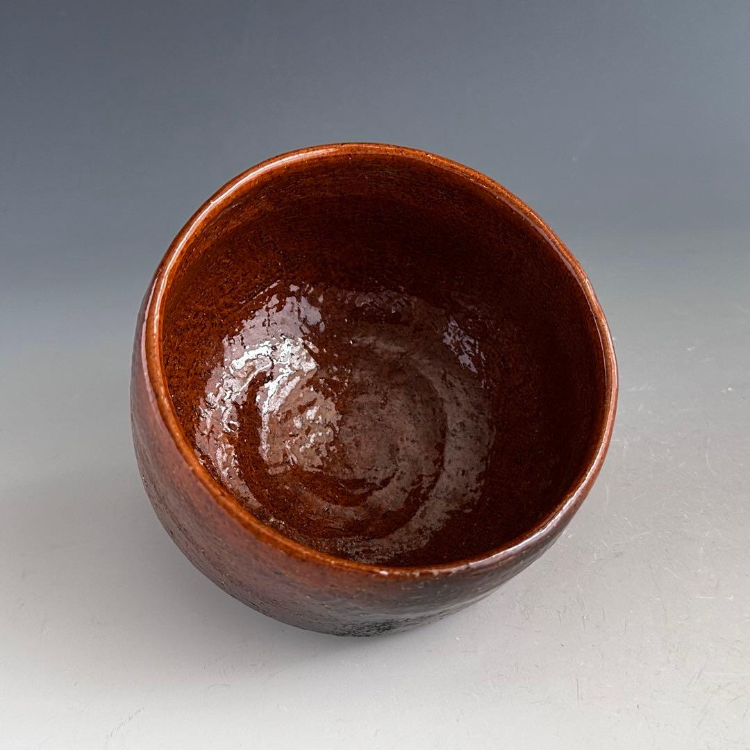 Ohi Ware Tea Bowl with Amber Glaze by Ohi Cho - Faceted Mentori