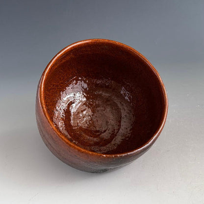 Ohi Ware Tea Bowl with Amber Glaze by Ohi Cho - Faceted Mentori