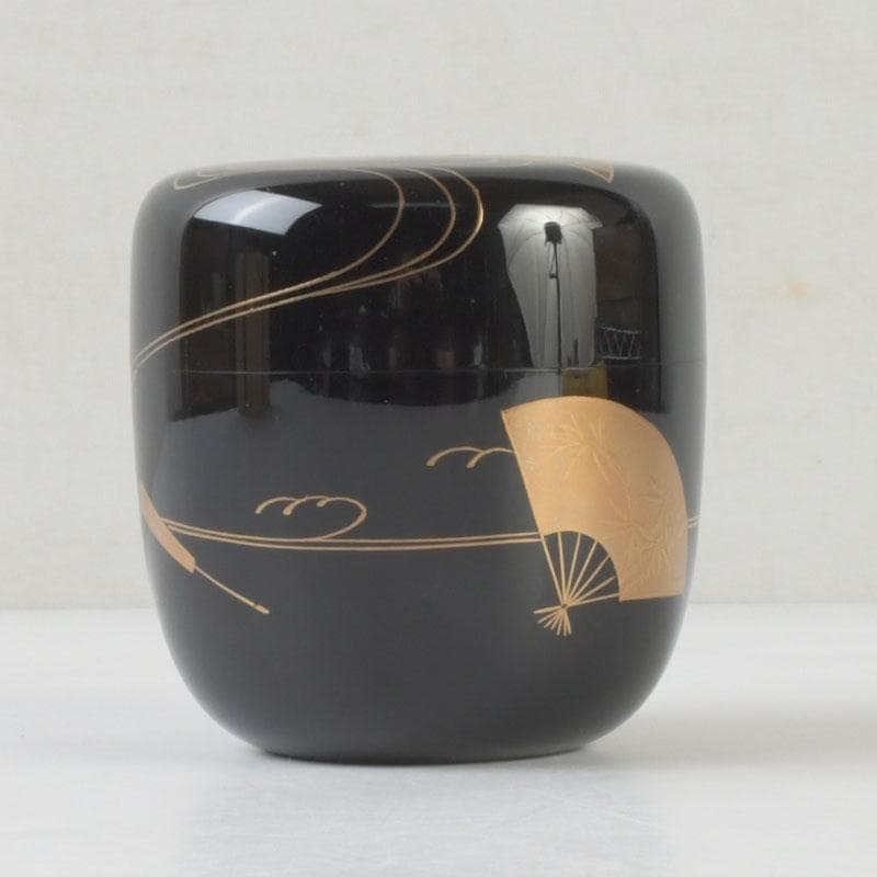 Wajima Lacquer Natsume Tea Caddy — Scattered Fans Maki-e by Maeda Koyo, Tomobako