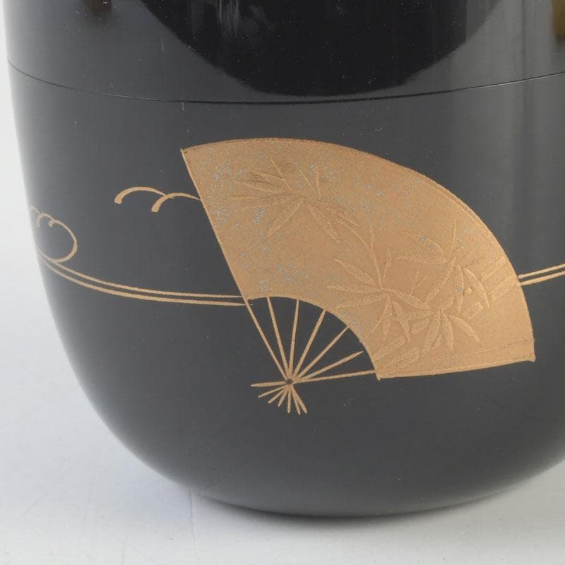 Wajima Lacquer Natsume Tea Caddy — Scattered Fans Maki-e by Maeda Koyo, Tomobako